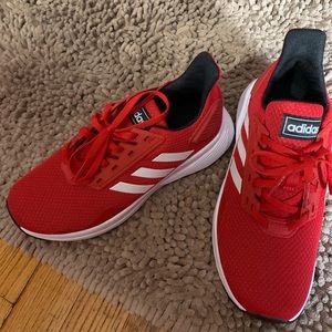 Women’s size 6 or Boys size 4. Red Adidas. New